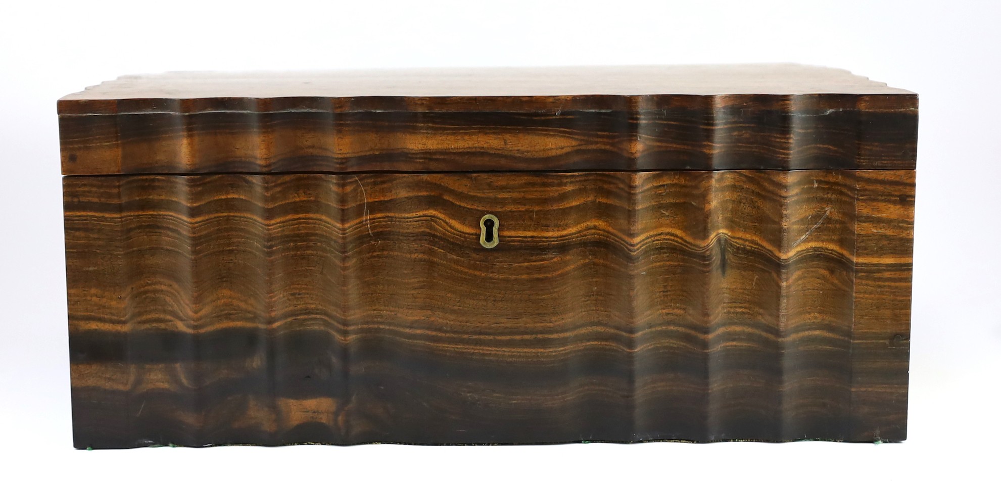 A mid 19th century Anglo Indian ivory inset ebony and other exotic hardwood travelling casket, 44cm wide 32cm deep 19cm high